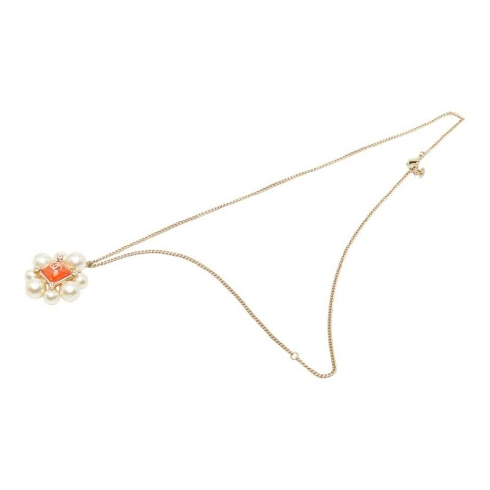 CHANEL Authentic Orange Pearl Logo Necklace - Picture 4 of 7
